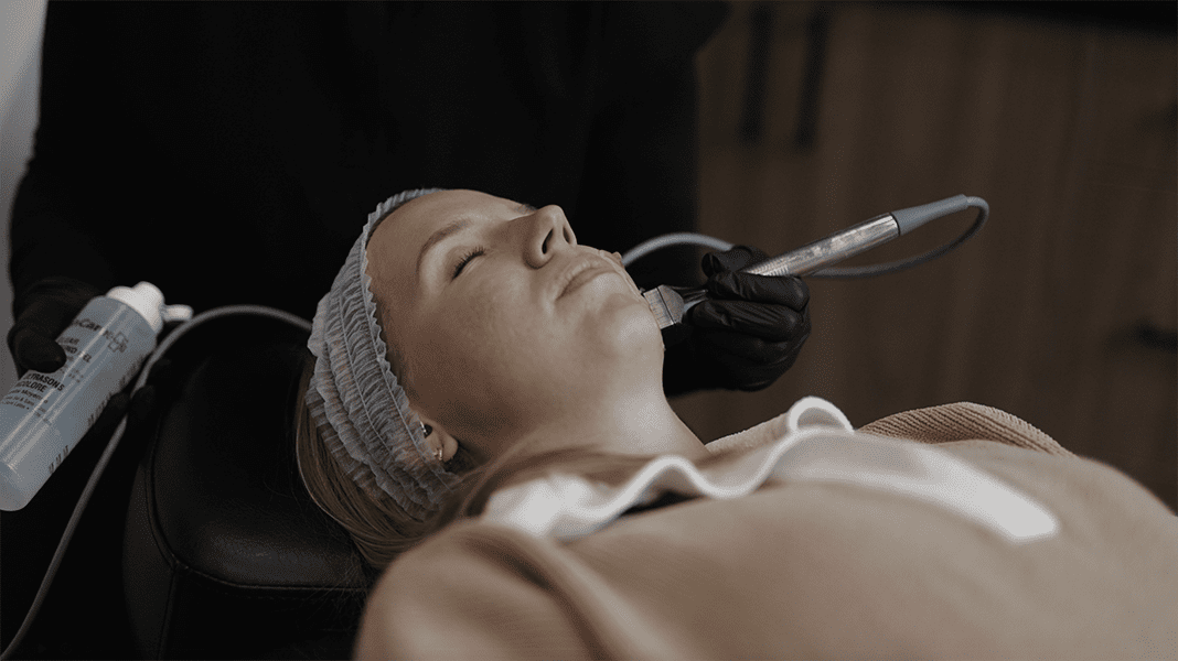 woman getting aChemical peel facial in london ontario at kontour by belita savage